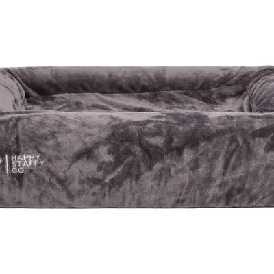 Orthopedic memory foam dog bed with pullover blanket cover displayed on a transparent background