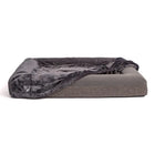 Pullover blanket cover partially opened on orthopedic memory foam bed to show inner bed.