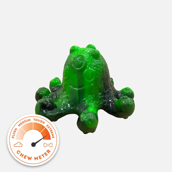Green alien creature dog chew toy from the Chewzilla® Galactic Quest Collection shown with a tough-chewer durability meter