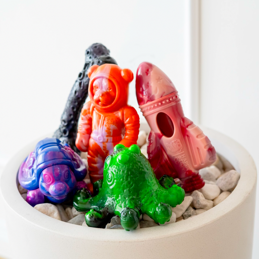 Close-up of Chewzilla® Galactic Quest dog toys including astronaut, rocket, octopus and bone