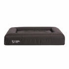 Minimalist studio shot of an Orthopedic Memory Foam Bed with durable bed cover on a white background