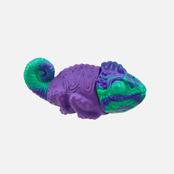 Purple and teal PowerFlex chameleon dog toy isolated on white background