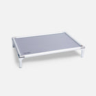 Chew-proof outdoor dog bed displayed on a white background.